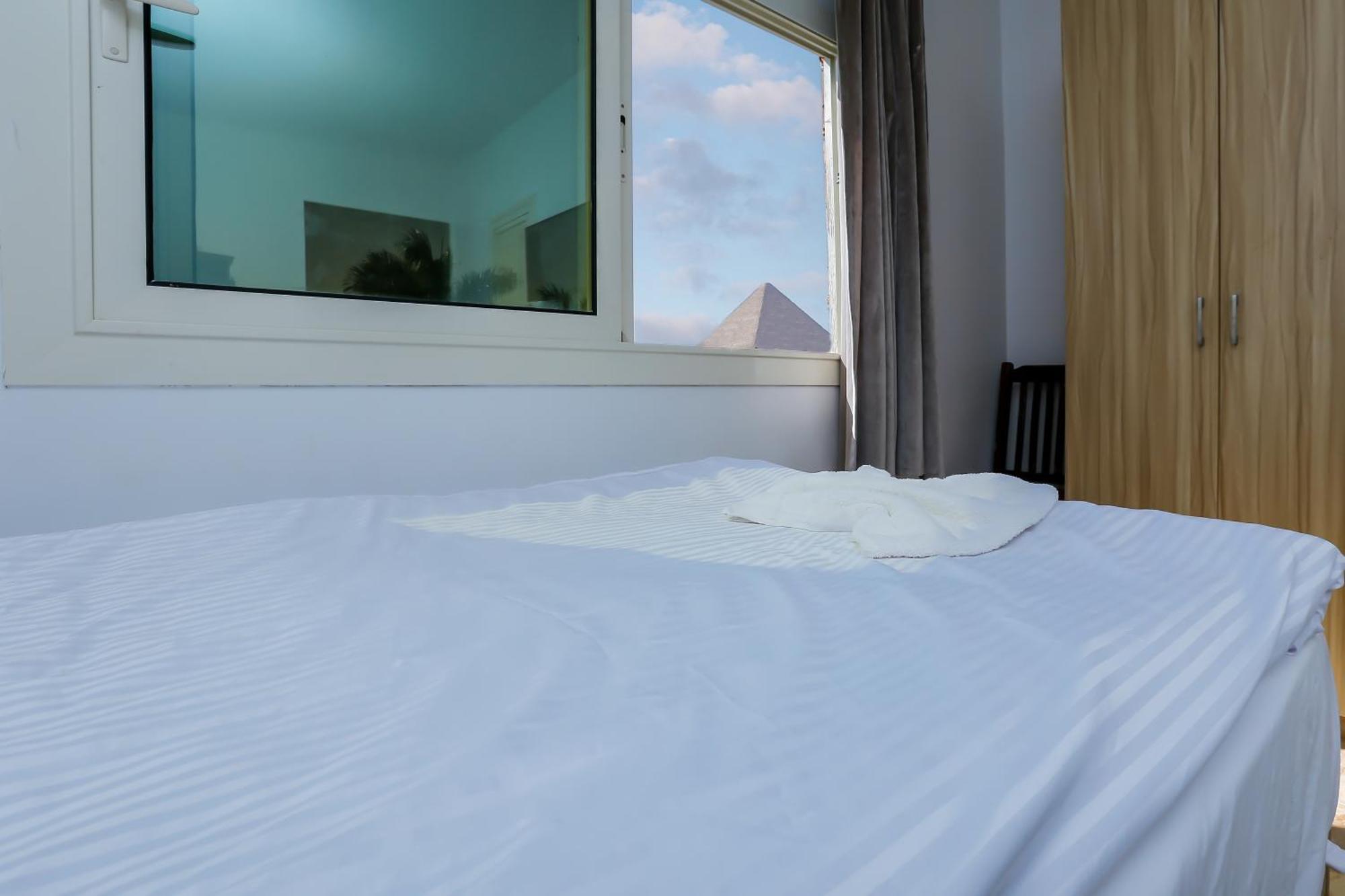 Pyramids Express View Hotel Kafret el-Gabal Buitenkant foto