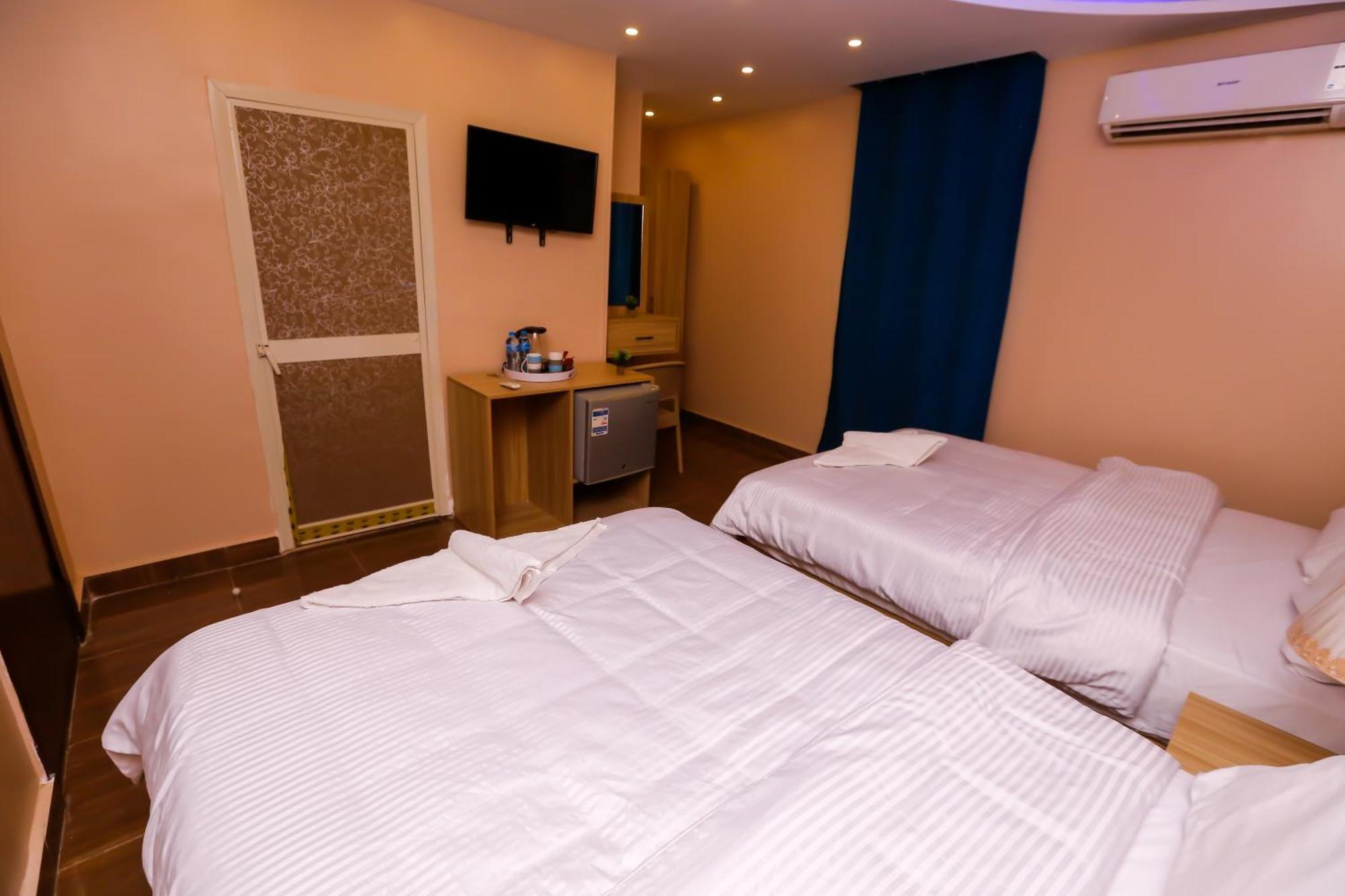 Pyramids Express View Hotel Kafret el-Gabal Buitenkant foto
