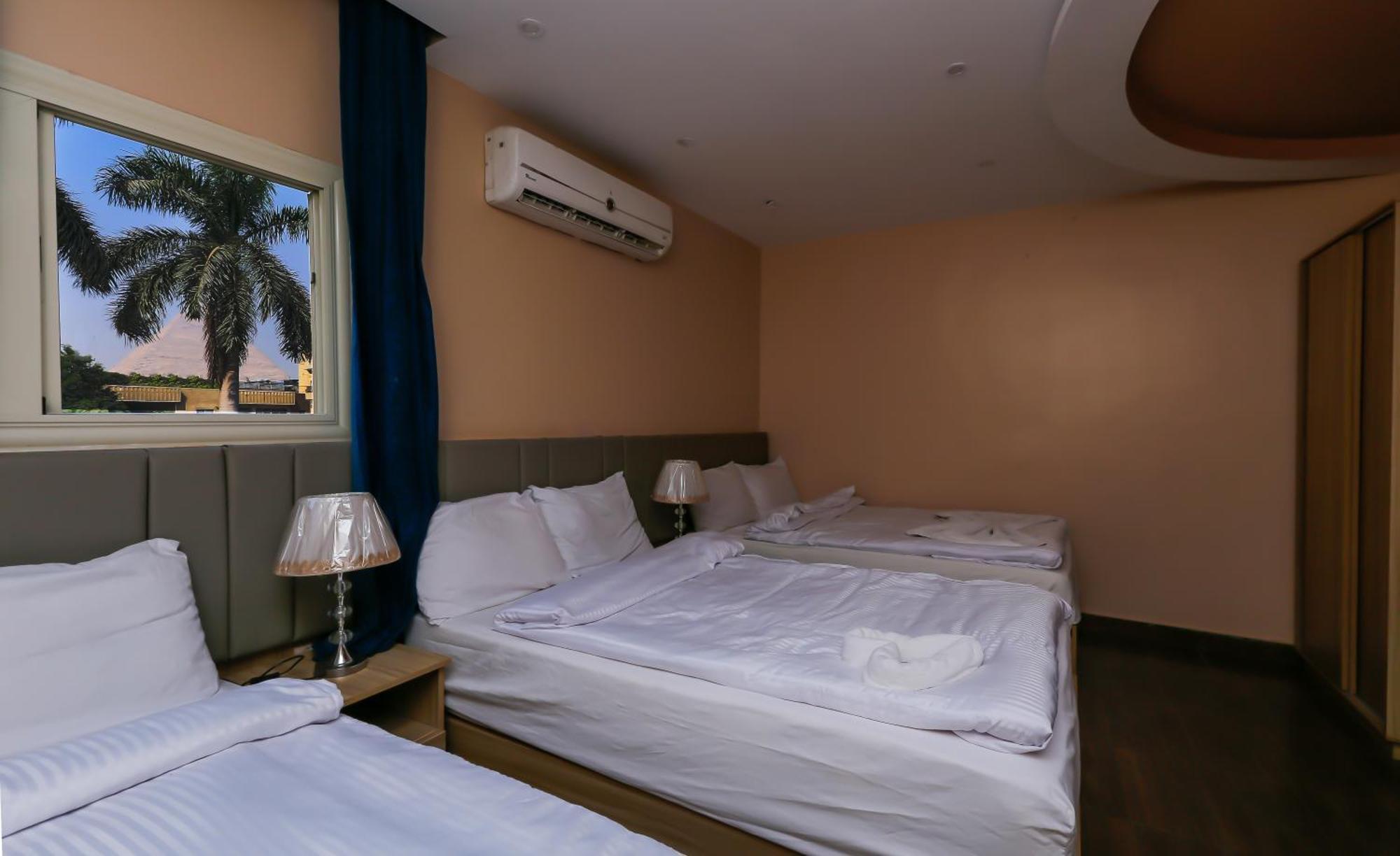 Pyramids Express View Hotel Kafret el-Gabal Buitenkant foto